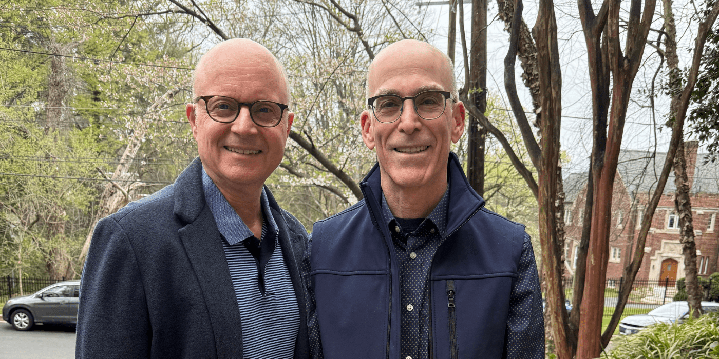 SPH prof Bradley Boekeloo and his partner Stan Drake smile to the camera